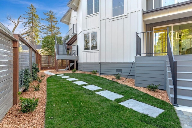 22 Cedar Ave, Kentfield, CA 94904 - view of side of home featuring board and batten siding, crawl space, and stairway