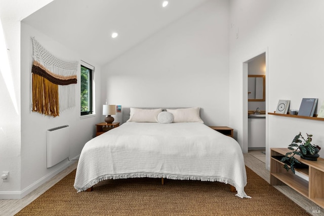 402 Donahue St, Sausalito, CA 94965 - bedroom with lofted ceiling, radiator heating unit, recessed lighting, and baseboards