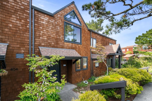 402 Donahue St, Sausalito, CA 94965 - view of front facade featuring a shingled roof
