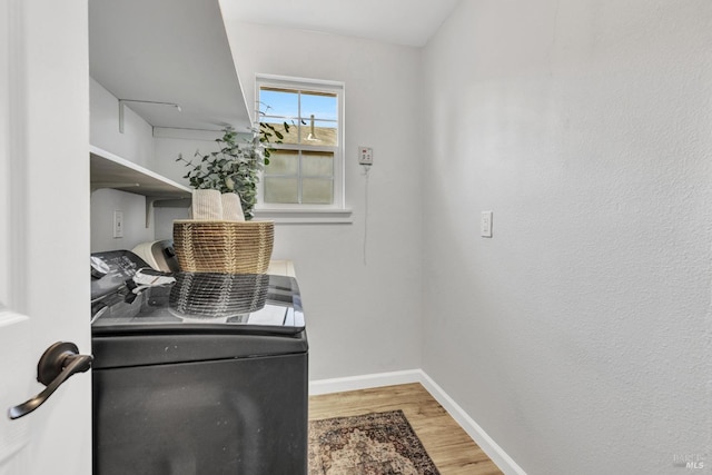 1753 15th St, San Pablo, CA 94806 - washroom featuring washing machine and clothes dryer, wood finished floors, and baseboards