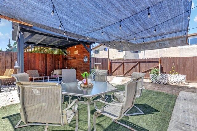 1753 15th St, San Pablo, CA 94806 - fenced backyard featuring a patio and outdoor dining space