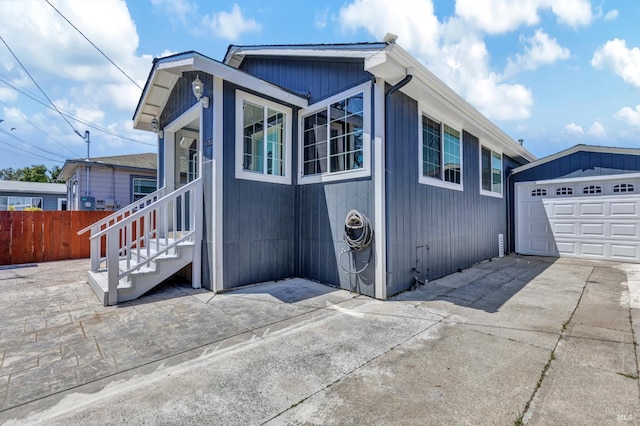 1753 15th St, San Pablo, CA 94806 - view of front of house with a garage, an outbuilding, and driveway