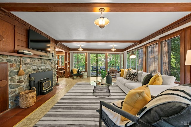 5600 Cazadero Hwy, Cazadero, CA 95421 - tiled living area featuring plenty of natural light, beam ceiling, and a wood stove