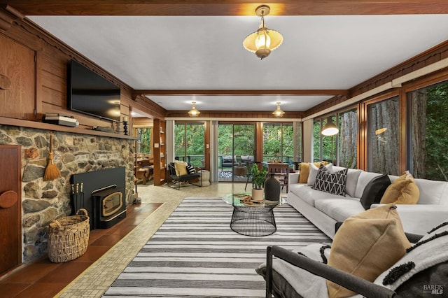 5600 Cazadero Hwy, Cazadero, CA 95421 - living room with healthy amount of natural light, a wood stove, and tile patterned flooring