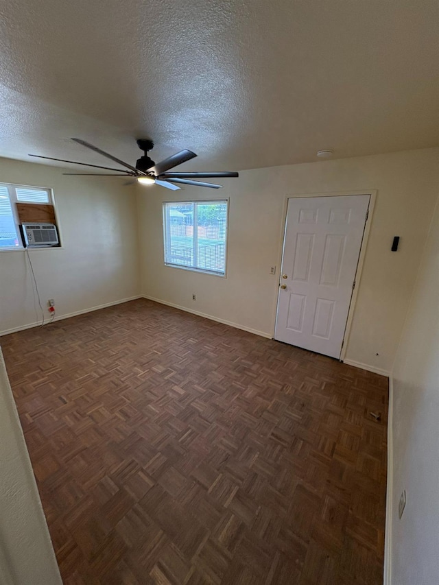 612 Union St, Isleton, CA 95641 - empty room with ceiling fan, baseboards, a textured ceiling, and cooling unit