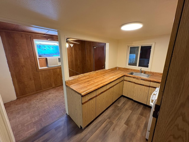 612 Union St, Isleton, CA 95641 - kitchen with wooden counters, a sink, range, dark wood-type flooring, and cooling unit