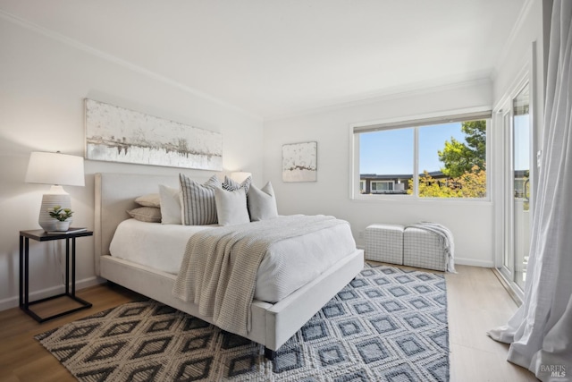 40 Redwood Ave, Corte Madera, CA 94925 - bedroom with crown molding, wood finished floors, and baseboards