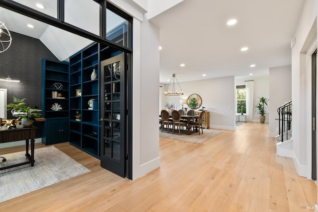 943 Appleridge Pl, Fairfield, CA 94534 - hallway featuring light wood-style floors, recessed lighting, stairs, a chandelier, and a desk