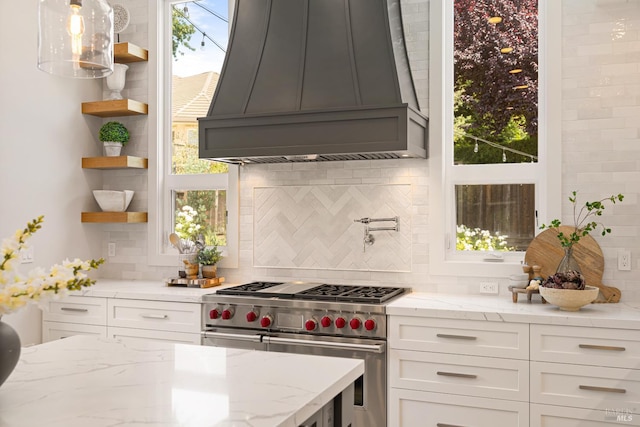 943 Appleridge Pl, Fairfield, CA 94534 - kitchen with luxury stove, custom range hood, open shelves, and decorative backsplash