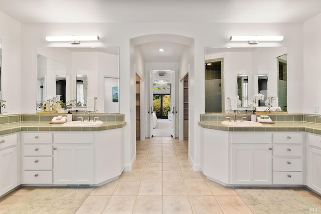943 Appleridge Pl, Fairfield, CA 94534 - bathroom featuring two vanities, tile patterned floors, and recessed lighting
