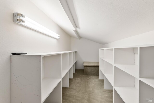 943 Appleridge Pl, Fairfield, CA 94534 - spacious closet with carpet floors and lofted ceiling