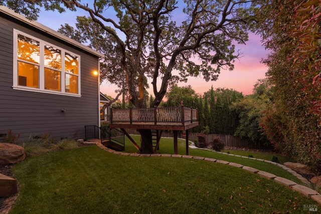 943 Appleridge Pl, Fairfield, CA 94534 - yard at dusk with a wooden deck and stairway