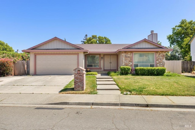 1417 Klamath Dr, Suisun City, CA 94585 - ranch-style home with a garage, concrete driveway, a chimney, and stone siding