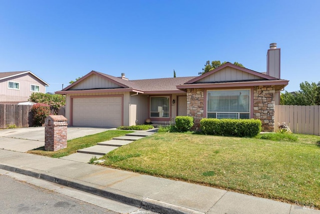 1417 Klamath Dr, Suisun City, CA 94585 - ranch-style house featuring a chimney, a garage, stone siding, and concrete driveway