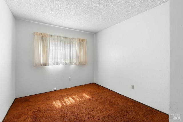 1417 Klamath Dr, Suisun City, CA 94585 - unfurnished room featuring carpet floors and a textured ceiling