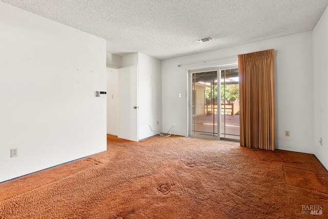 1417 Klamath Dr, Suisun City, CA 94585 - carpeted empty room featuring a textured ceiling
