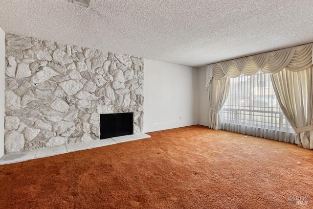 1417 Klamath Dr, Suisun City, CA 94585 - unfurnished living room featuring carpet floors, a textured ceiling, and a stone fireplace