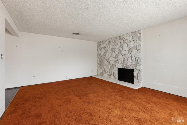 1417 Klamath Dr, Suisun City, CA 94585 - unfurnished living room with carpet flooring, a textured ceiling, and a fireplace