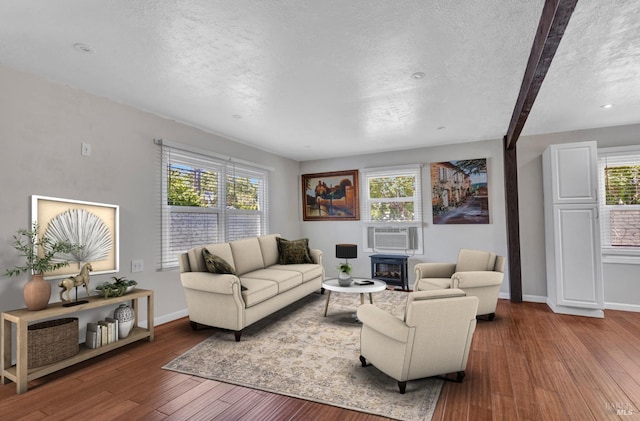 600 Buss Ave, Vallejo, CA 94591 - living area featuring a textured ceiling, hardwood / wood-style floors, baseboards, beam ceiling, and cooling unit