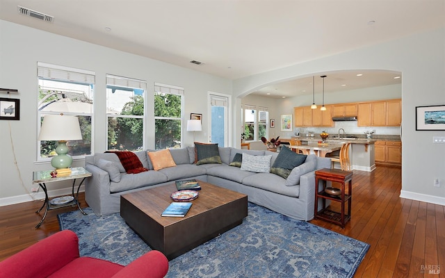 8596 Starr Rd, Windsor, CA 95492 - living area with arched walkways, dark wood-style flooring, baseboards, and recessed lighting