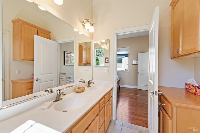 8596 Starr Rd, Windsor, CA 95492 - full bathroom featuring double vanity and baseboards