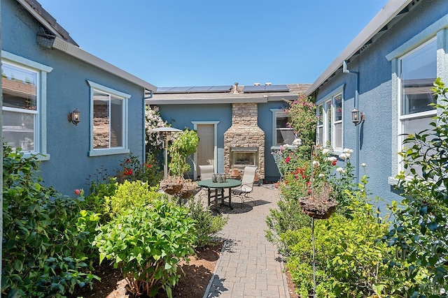 8596 Starr Rd, Windsor, CA 95492 - view of patio / terrace featuring an outdoor stone fireplace