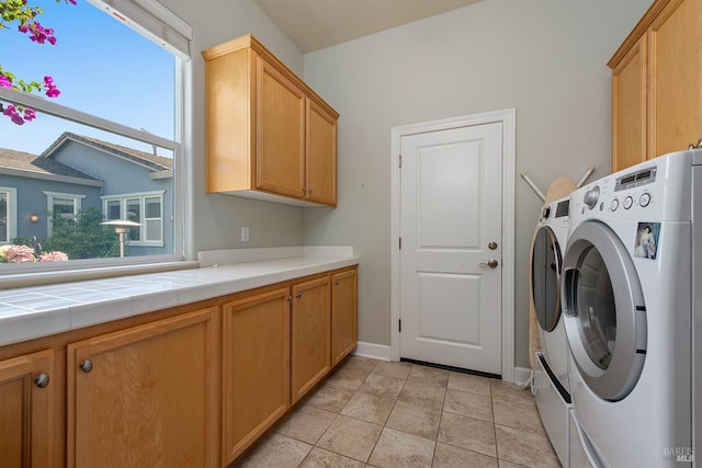 8596 Starr Rd, Windsor, CA 95492 - laundry area with cabinet space, washing machine and dryer, healthy amount of natural light, and baseboards