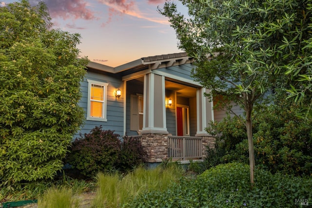 8596 Starr Rd, Windsor, CA 95492 - view of front of home with stone siding and covered porch
