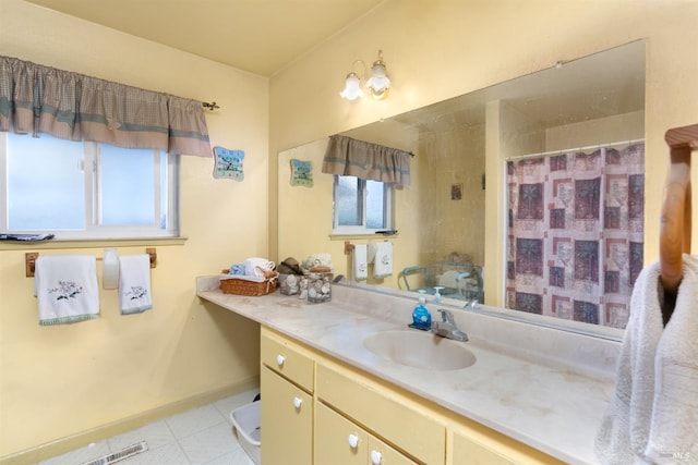 6048 Dawn Dr, Rohnert Park, CA 94928 - full bathroom with vanity, baseboards, tile patterned floors, and curtained shower