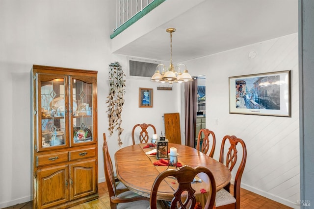 6048 Dawn Dr, Rohnert Park, CA 94928 - dining space featuring baseboards and a chandelier