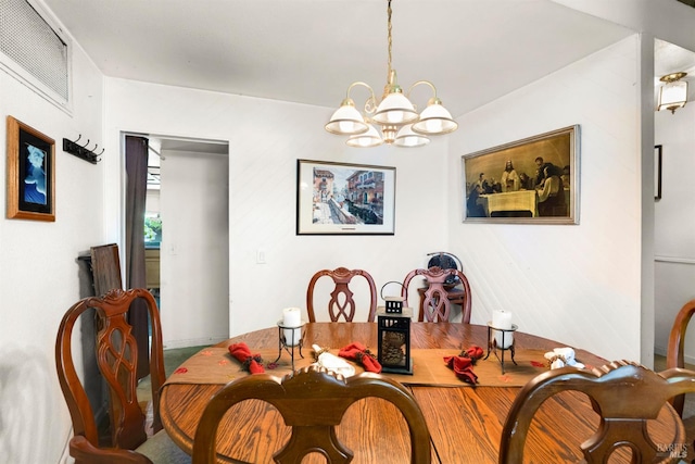 6048 Dawn Dr, Rohnert Park, CA 94928 - dining area featuring a chandelier and carpet
