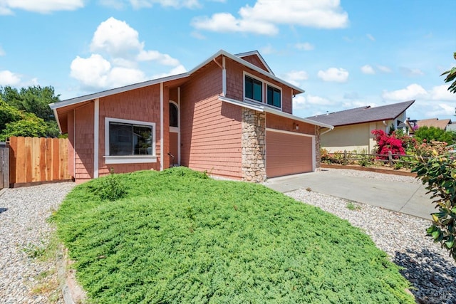 225 Riverview Dr, Vallejo, CA 94589 - view of front facade featuring stone siding, driveway, and a garage