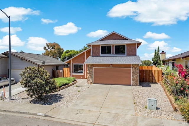225 Riverview Dr, Vallejo, CA 94589 - view of front of property featuring stone siding, driveway, and an attached garage