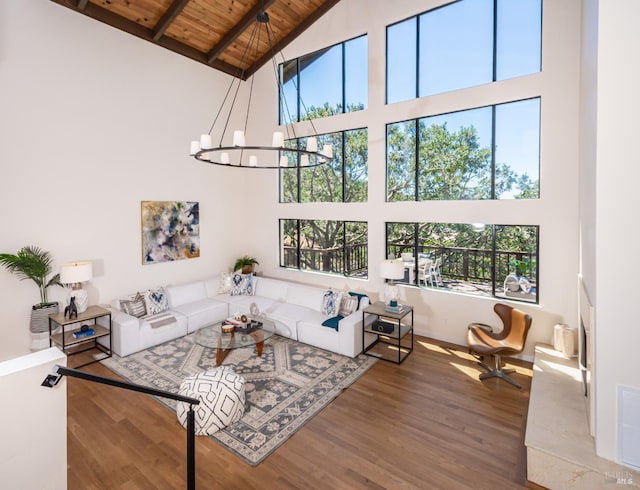 1043 La Quinta Ct, Napa, CA 94559 - living room with a chandelier, wood ceiling with exposed beams, high vaulted ceiling, wood finished floors, and healthy amount of natural light