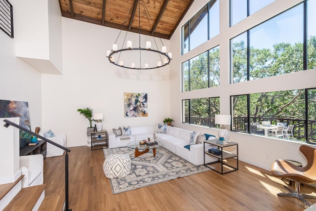1043 La Quinta Ct, Napa, CA 94559 - living area with wood ceiling with exposed beams, high vaulted ceiling, a chandelier, and wood finished floors