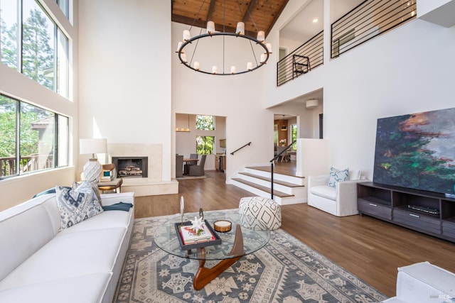 1043 La Quinta Ct, Napa, CA 94559 - living room with high vaulted ceiling, wood finished floors, healthy amount of natural light, wooden ceiling, and a chandelier