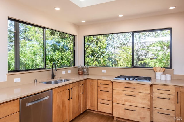 1043 La Quinta Ct, Napa, CA 94559 - kitchen with stainless steel appliances, a sink, light countertops, light brown cabinetry, and recessed lighting