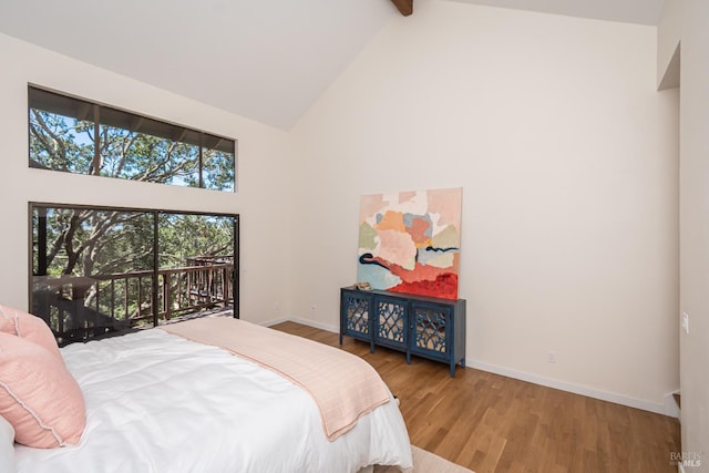 1043 La Quinta Ct, Napa, CA 94559 - bedroom featuring high vaulted ceiling, wood finished floors, baseboards, beamed ceiling, and access to exterior