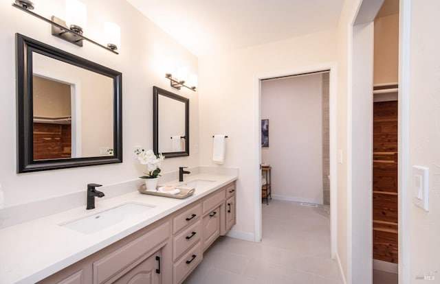 1043 La Quinta Ct, Napa, CA 94559 - bathroom featuring double vanity, tile patterned flooring, a spacious closet, and baseboards
