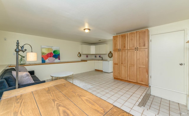 1043 La Quinta Ct, Napa, CA 94559 - kitchen featuring dishwasher, light countertops, light tile patterned floors, and a sink