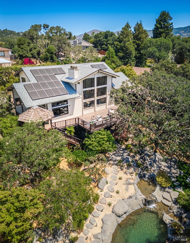 1043 La Quinta Ct, Napa, CA 94559 - back of property featuring solar panels and a shingled roof