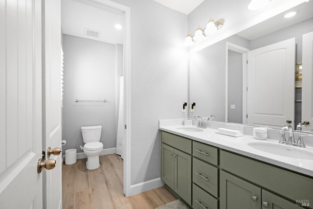 840 Allegro Ct, Fairfield, CA 94534 - full bathroom with wood finished floors, toilet, double vanity, and baseboards