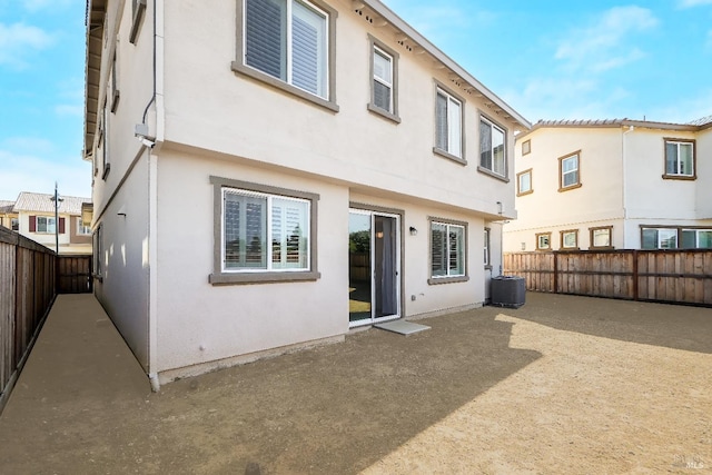 840 Allegro Ct, Fairfield, CA 94534 - back of house with stucco siding, a fenced backyard, a patio, and cooling unit