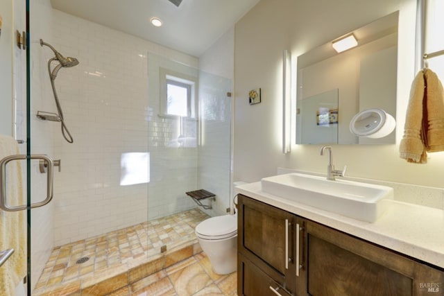 1067 Darms Ln, Napa, CA 94558 - bathroom with a shower stall, toilet, vanity, and recessed lighting