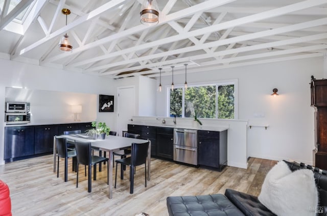 1067 Darms Ln, Napa, CA 94558 - dining space with a skylight, light wood-type flooring, high vaulted ceiling, and beamed ceiling