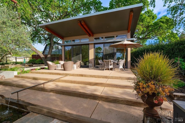 1067 Darms Ln, Napa, CA 94558 - view of patio with outdoor dining space and a sunroom
