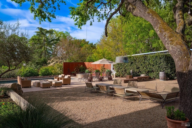 1067 Darms Ln, Napa, CA 94558 - view of patio with an outdoor living space with a fire pit