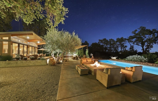 1067 Darms Ln, Napa, CA 94558 - pool at twilight featuring an outdoor fire pit, a patio area, and an outdoor pool