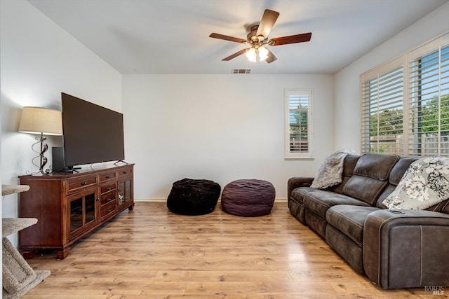 236 Cogburn Way, Vacaville, CA 95687 - living area featuring a ceiling fan, light wood-style flooring, and baseboards