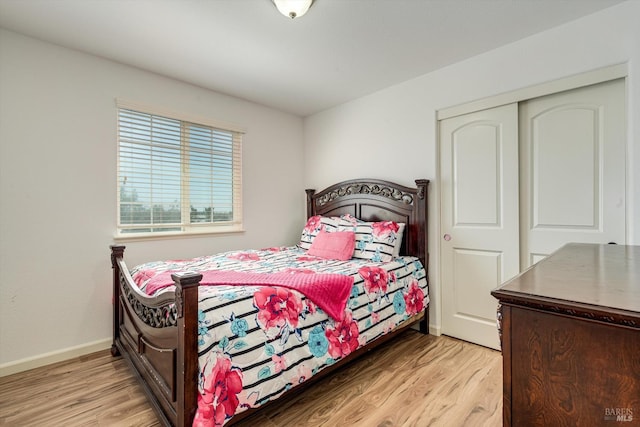 236 Cogburn Way, Vacaville, CA 95687 - bedroom featuring wood finished floors, baseboards, and a closet